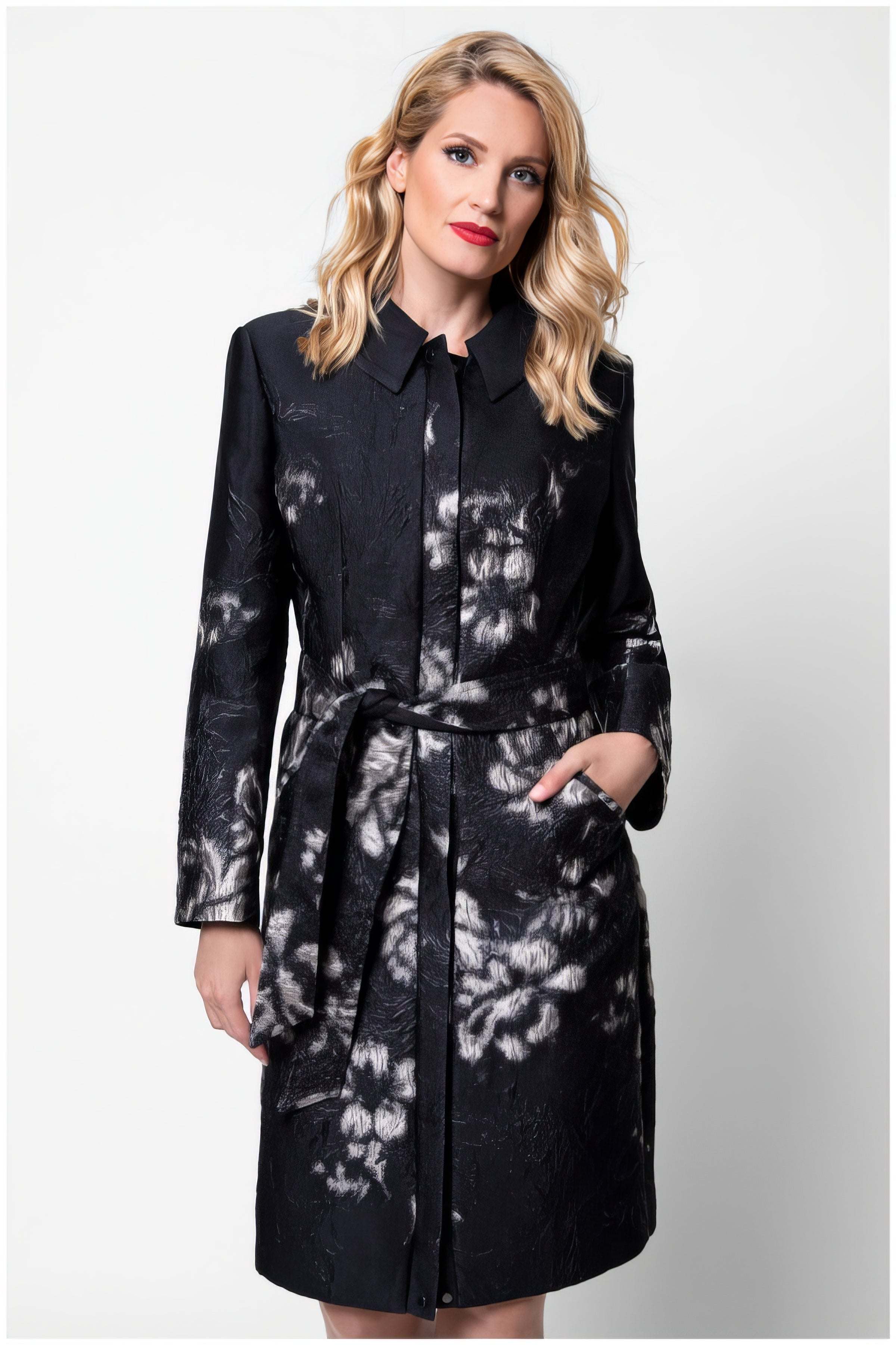 Woman wearing Emma Light Coat with Silver Floral Jacquard featuring sculpted tailoring and subtle metallic sheen on black base