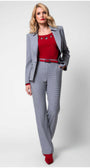 Woman wearing Elena Houndstooth Tailored Blazer paired with matching pants and red top showcasing modern elegance.