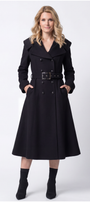 Woman wearing a black coat with a belt on a white background