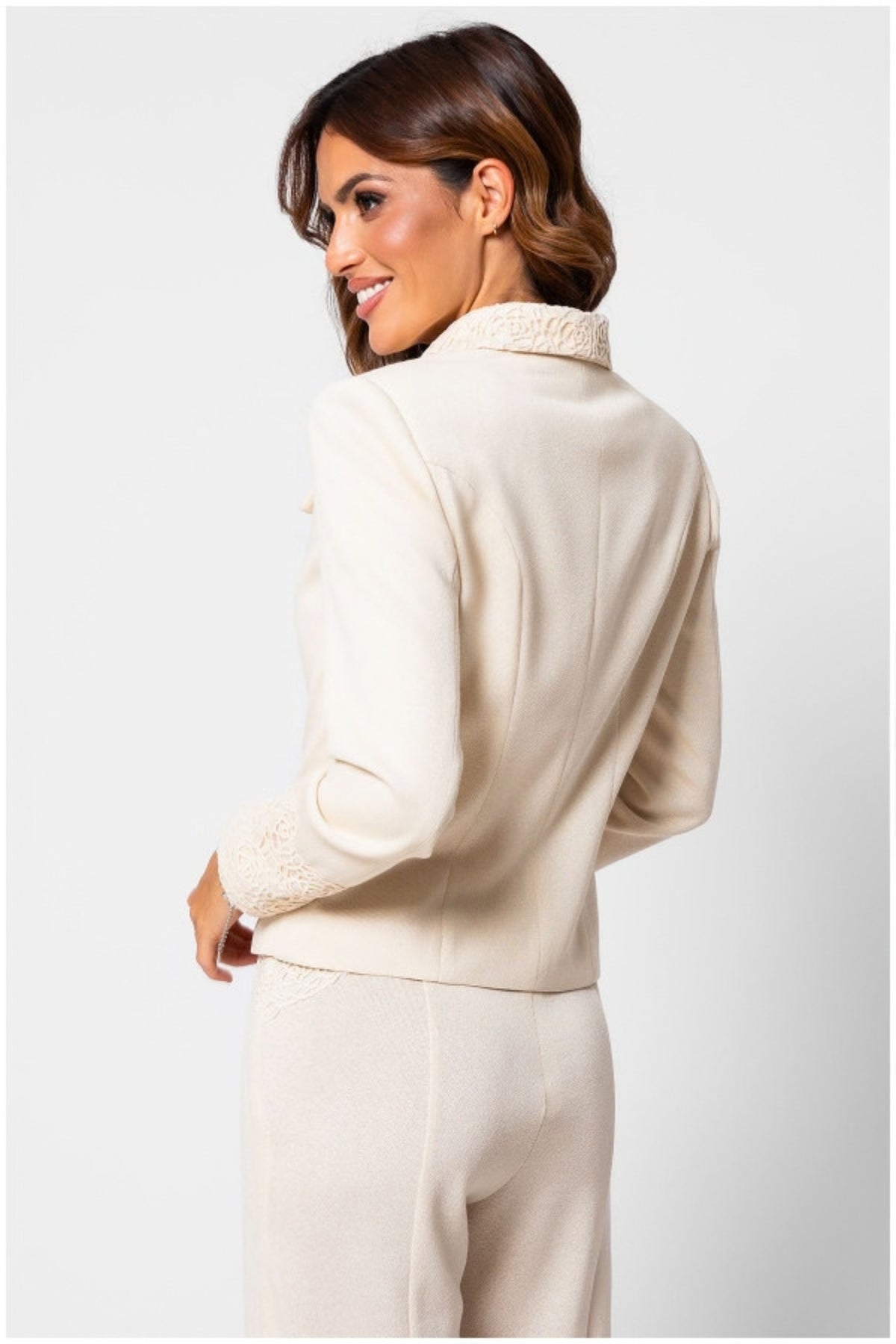 Ivory Tailored Lace Blazer, Jody. Back view on the model with matching ivory pants.