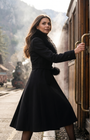 Black Wool Coat with Fur Collar, Lucy. Wool coat. Worn with the collar on, boarding a vintage wooden train carriage.