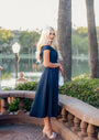 Navy off-shoulder midi dress for black-tie optional wedding and mother of the bride, Greta Luna Fashion House